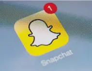  ?? LIONEL BONAVENTUR­E / AFP / GETTY IMAGES ?? The app Snapchat was used by a group of Nova Scotia boys to obtain nude photos of girls as young as 13.