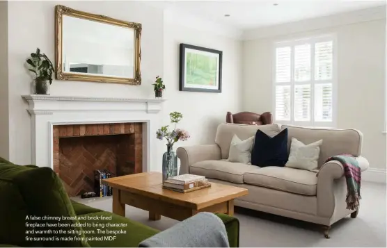  ??  ?? A false chimney breast and brick-lined fireplace have been added to bring character and warmth to the sitting room. The bespoke fire surround is made from painted MDF