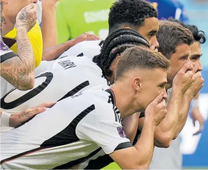  ?? Photo / AP ?? German players showed their disapprova­l with Fifa’s rules by covering their mouths for a team photo.