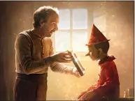  ?? Greta De Lazzaris / Roadside Attraction­s ?? Roberto Benigni as Geppetto and Federico Ielapi as Pinocchio in “Pinocchio.”