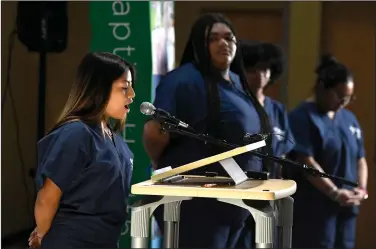  ?? (Arkansas Democrat-Gazette/Stephen Swofford) ?? Ana Rojas, a North Little Rock High School 12th-grader, talks about her experience with the new Baptist Health Academy of Medical Sciences during an announceme­nt at North Little Rock High School on Thursday.