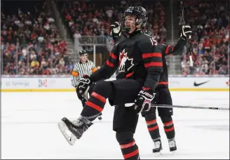  ?? CP PHOTO CODIE MCLACHLAN ?? Canada's Josh Williams (15) celebrates a goal during first period Hlinka Gretzky Cup action against Sweden, in Edmonton on Wednesday.