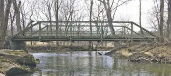  ?? BY RACHEL NEEDHAM ?? e pony truss on North Poes Road has spanned the Jordan River for more than eight decades.