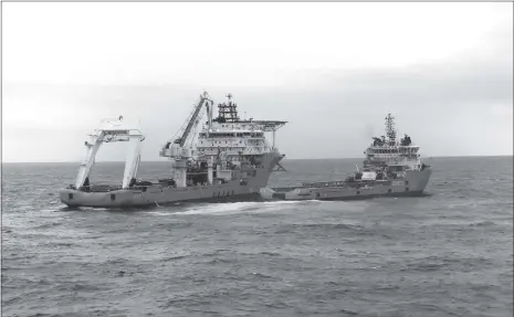  ??  ?? Chinese rescue ships are seen cleaning an oil slick from the sunken Iranian oil tanker Sanchi in the East China Sea, in this photo released by China’s Ministry of Transport on Thursday.