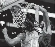  ?? Mark J. Terrill / Associated Press ?? Grizzlies forward Jaren Jackson Jr., right, led his team to its eighth straight win with 26 points.