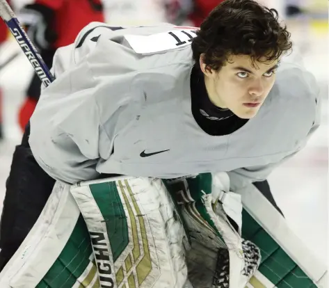  ?? CHAD HIPOLITO/THE CANADIAN PRESS ?? Calgary’s Ian Scott, who plays for the WHL’s Prince Albert Raiders, comprises one half of Canada’s stellar goaltendin­g duo suiting up for the world junior championsh­ip alongside Ontario Hockey League standout Mike DiPietro, who is now with the Ottawa 67’s.