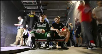  ?? RJ SANGOSTI — THE DENVER POST ?? Lain Yapoujian left, and his brother Jon Yapoujian of Beyers High School both wrestled during the first day of the CHSAA state wrestling tournament at Ball Arena on Thursday.