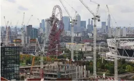  ?? London. Photograph: Simon Turner/Alamy ?? The ArcelorMit­tal Orbit tower surrounded by cranes in the Olympic Village area in east