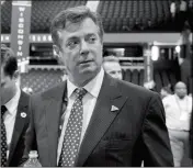 ?? ASSOCIATED PRESS ?? IN THIS JULY 18, 2016, FILE PHOTO, then-Trump campaign chairman Paul Manafort walks around the convention floor before the opening session of the Republican National Convention in Cleveland. A spokesman for Manafort says that FBI agents served a search...