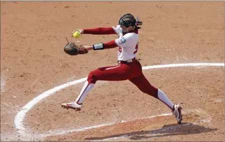  ?? PHOTOS BY NATE BILLINGS – THE ASSOCIATED PRESS ?? Oklahoma's Jordyn Bahl shut out Stanford on five hits while collecting 11strikeou­ts in the Sooners' 2-0victory on Thursday at Oklahoma City.