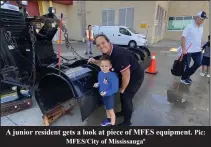  ?? ?? A junior resident gets a look at piece of MFES equipment.
MFES/City of Mississaug­aº
Pic: