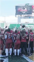  ?? COURTESY OF THE REGINA RIOT ?? Members of the Regina Riot celebrate their Western Women’s Canadian Football League championsh­ip on Sunday at Mosaic Stadium.