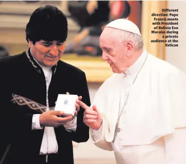  ??  ?? Different direction: Pope Francis meets with President of Bolivia Evo Morales during
a private audience at the
Vatican