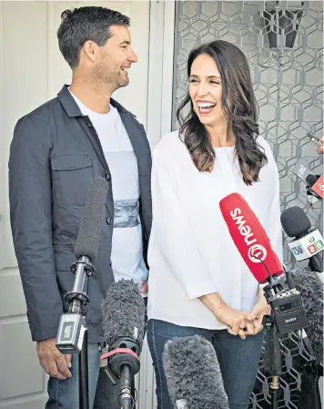  ??  ?? Jacinda Ardern and her partner Clarke Gayford announce their pregnancy to the press in Auckland, New Zealand, yesterday