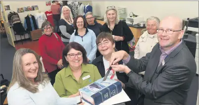  ??  ?? MILESTONE: From left, Wimmera Regional Library Service chief executive Ann Twyford, librarians Mary Dalgleish and Ros Ryan and board member Kevin O’brien cut a 50th birthday cake for the Horsham Library. Picture: PAUL CARRACHER