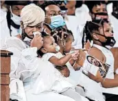  ?? CURTIS COMPTON/GETTY-AFP ?? Tomika Miller, wife of Rayshard Brooks, cries while holding their daughter during his funeral Tuesday in Atlanta.