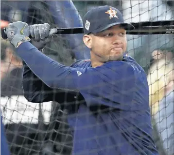  ?? DAVID J. PHILLIP/AP ?? Yuli Gurriel, taking batting practice Saturday before Game 4 in Houston, will be suspended for five games next season.