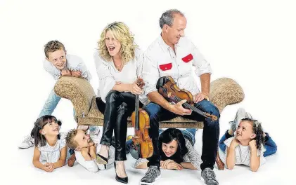  ?? SUBMITTED PHOTO ?? Fiddler Natalie Macmaster with her husband, Donnell Leahy, and five of their seven children.