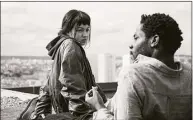  ?? IFC Films / TNS ?? Lucie Zhang, left, and Makita Samba in the film “Paris, 13th District.”