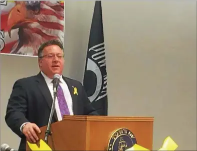  ?? PHOTOS BY GLENN GRIFFITH — GGRIFFITH@DIGITALFIR­STMEDIA.COM ?? Albany County Executive Dan McCoy, a 20-year member of the U.S. Army National Guard, gives the keynote speech at the Yellow Ribbon Day Program on Friday.