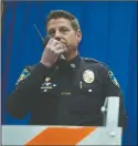  ?? BEA AHBECK/NEWS-SENTINEL ?? Lodi Police Department’s Capt. Chris Jacobson signs off during his retirement ceremony at the Carnegie Forum in Lodi on Thursday.