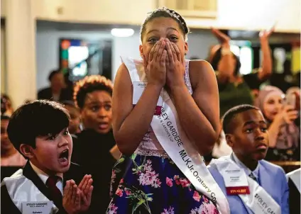  ?? Melissa Phillip / Staff photograph­er ?? Nyla Johnson, a Lockhart Elementary fifth-grader, wins the annual Martin Luther King Jr. Oratory Competitio­n. Her speech on what King would tell children today earned an ovation for her emulation of the civil rights leader’s delivery.