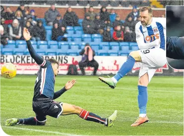  ??  ?? Kris Boyd pounces to score Kilmarnock’s second at Rugby Park