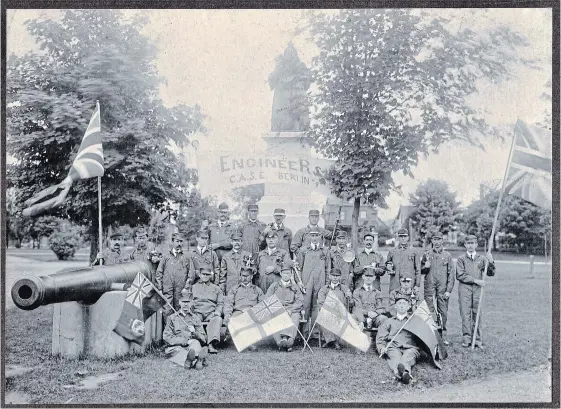  ?? CREDIT: COURTESY HELENE JANZEN ?? A day in Victoria Park during the Great War. Local Berlin-Waterloo stationery engineers gather to show patriotic and profession­al pride. At each end, the Union flag, Canada's national flag; in the middle, the Royal Canadian Navy's White Ensign; and in...