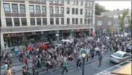  ??  ?? Protesters gather on a street in St. Louis, Mo., on Saturday, Sept. 16, 2017, in response to a not guilty verdict in the trial of former St. Louis Police officer Jason Stockley. On Friday, Stockley, a white man, was acquitted in the 2011 killing of...