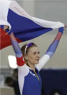  ?? AP ?? NEW WORLD STANDARD: Russia's Natalia Voronina celebrates after competing in the women's 5,000 meters during the world single distances speedskati­ng championsh­ips on Saturday in Kearns, Utah.