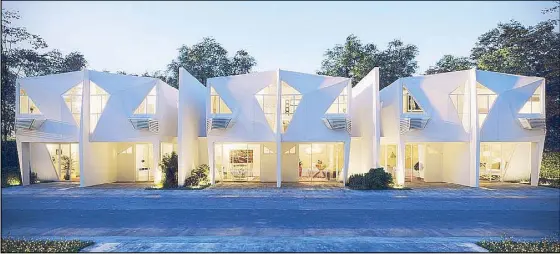  ??  ?? Architect Ed Calma designed these polygon rowhouses for the Cluster Village.