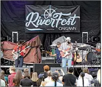  ?? Special to the Arkansas Democrat-Gazette ?? A band performs during RiverFest 2018 in Riverfront Park in Little Rock. Organizers said on Monday that Riverfest won’t return in 2019 but is tentativel­y planned for May 2020.