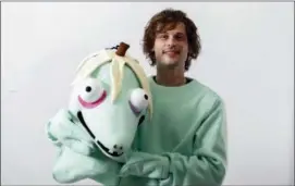  ?? PHOTO BY BRIAN ACH — INVISION — AP ?? This photo shows actor and author Matthew Gray Gubler poses for a portrait in New York wearing a costume of his title character in his children’s book “Rumple Buttercup: A Story of Bananas, Belonging and Being Yourself.”