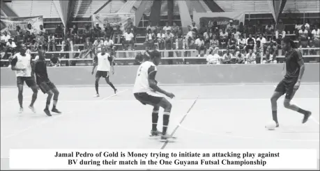 ?? ?? Jamal Pedro of Gold is Money trying to initiate an attacking play against BV during their match in the One Guyana Futsal Championsh­ip
