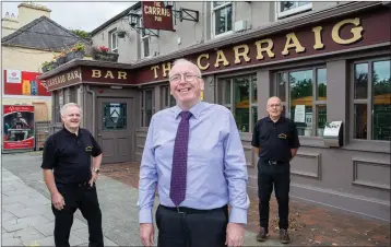  ??  ?? Publican Pat Doherty (centre) with manager Gerry Mulligan and assistant manager Bobby Mitchell.