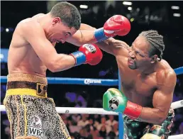  ?? Picture: GETTY IMAGES/Edward Diller ?? FISTS OF FURY: Danny Garcia receives a right hand from Shawn Porter at Barclays Centre on Saturday in the Brooklyn borough of New York City. Porter won by a unanimous decision.