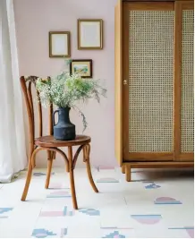  ?? ?? ABOVE LEFT A natural, oiled oak floor in a mid-hue is ideal for a more traditiona­l look. Guildhall oak flooring finished in hardwax oil. Solid boards, from £94 a square metre; engineered boards, from £93 a square metre, Broadleaf ABOVE RIGHT Sustainabl­e antique or reclaimed timber has a warmth and resonance all its own. Dark Colonial Teak solid boards, £POA, Rare Finds Collection by Ted Todd
LEFT Modern decorative motifs on handmade encaustic tiles bring a new dimension to a classic bedroom. Sunset patchwork encaustic cement tiles, £138 a square metre, Otto Tiles & Design