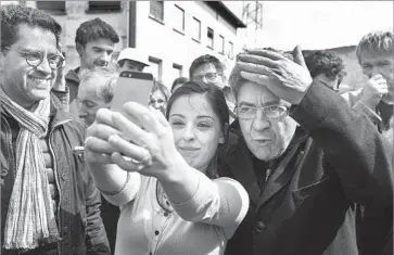  ?? Sebastien Bozon AFP/Getty Images ?? JEAN-LUC MELENCHON says he is appealing to voters who feel abandoned by France’s mainstream parties. “If things were going well in society, nobody would need me,” the hard-left candidate said.