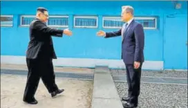  ?? REUTERS FILE ?? So near yet so far: South Korean President Moon Jaein (right) and North Korean leader Kim Jong Un during their first meeting at the truce village of Panmunjom on April 27.