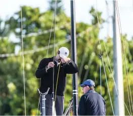  ?? P H O T O : PA U L T O D D / OUTSIDE IMAGES ?? A day of measuremen­ts from the rig on down to the waterline is all you need to ensure symmetry around the boat.