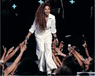  ?? ?? JANET Jackson accepts the ultimate icon: music dance visual award at the BET Awards at the Microsoft Theater on June 28, 2015, in Los Angeles. | AP