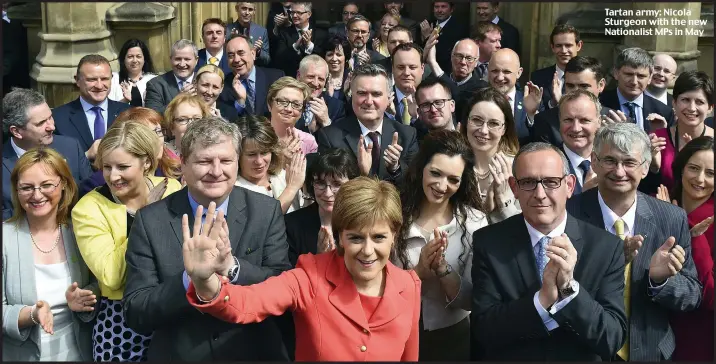  ??  ?? Tartan army: Nicola Sturgeon with the new Nationalis­t MPs in May