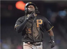  ?? JOE CAMPOREALE/USA TODAY SPORTS ?? Pirates right fielder-first baseman Josh Bell has slugged 14 home runs to go along with 44 RBI this season.