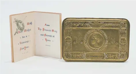 ??  ?? Princess Mary brass tin and Christmas card on display at Eden Camp Museum, Malton.