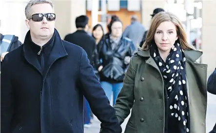  ?? AL CHAREST ?? Rod and Jennifer O’Brien, parents of Nathan O’Brien, leave the Calgary Courts Centre after attending Friday’s sentencing hearing.