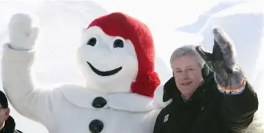  ?? JACQUES BOISSINOT/THE CANADIAN PRESS ?? Prime Minister Stephen Harper and Bonhomme Carnaval during the prime minister’s visit to Quebec City on Feb. 13. Polls show Quebecers strongly support Conservati­ves’ stand on terror.