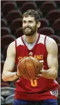  ?? PAUL SANCYA / ASSOCIATED PRESS ?? Kevin Love will move this season from forward to the starting center position.