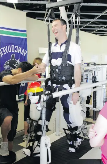  ??  ?? Michael Coss, who was told he would never walk again after suffering an accident, is walking without a cane, thanks to the Lokomat machine that he believes helped him graduate from wheelchair to walking.