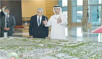  ?? (Shlomi Amsalem/GPO/Reuters) ?? FOREIGN MINISTER Yair Lapid and UAE Foreign Minister Sheikh Abdullah bin Zayed Al Nahyan meet in Abu Dhabi last month.