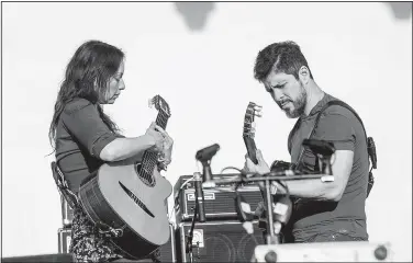  ?? Invision/AP/AMY HARRIS ?? Rodrigo y Gabriela … no words needed for the duo’s instrument­al prowess.
